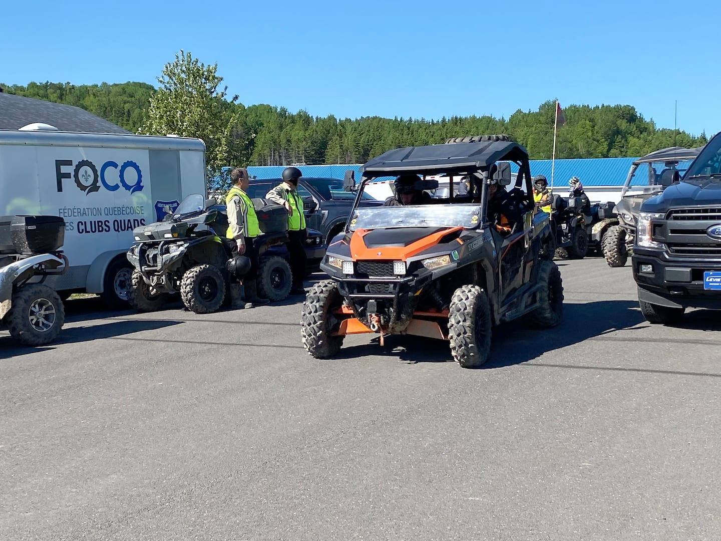 Several quad riders on the trails in Gaspésie