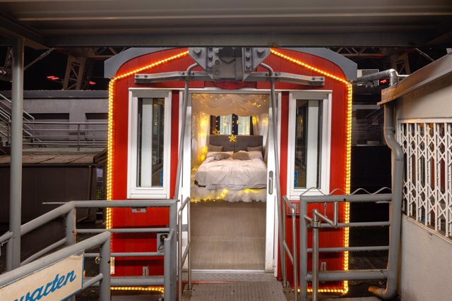 RELEASE: Floating on Cloud Nine: Emma Transforms Ferris Wheel Car Into a Bedroom