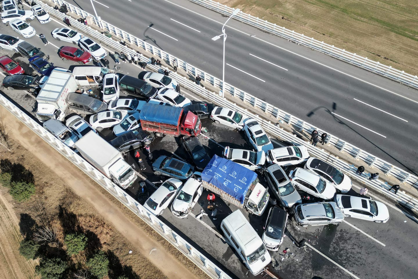 [IN IMAGES] Hundreds of vehicles involved in a pileup in China