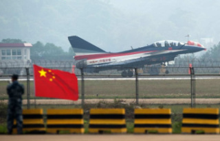 China: military plane crashes into homes, at least...