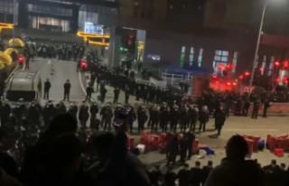 China: Workers clash with police at COVID-19 test...